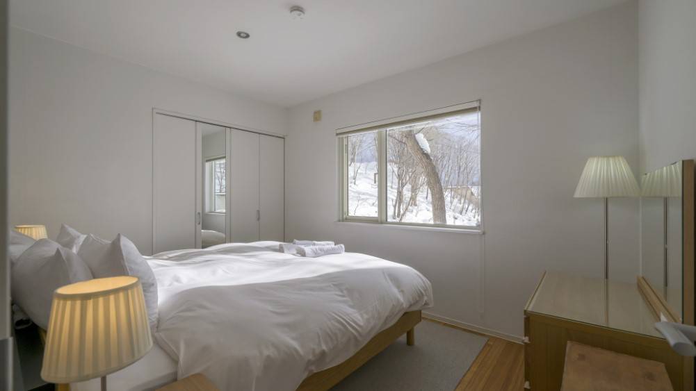 Nature Chalet - Restful guest bedroom with a view